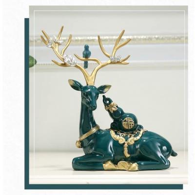 TƯỢNG HƯƠU TÀI LỘC KÈM BÌNH HOA